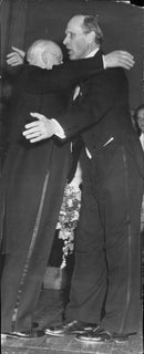 Hugo AlfvÃ©n being courted after the concert in the Concert Hall of the file. Dr. Brother Jonzon with flower bouquet and embrace - 28 April 1947 - Vintage Photograph