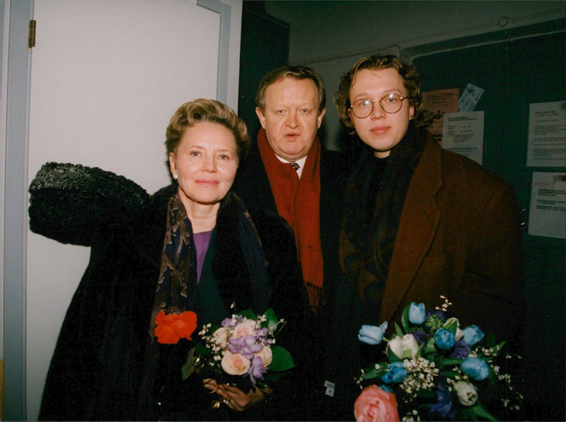 Martti Ahtisaari and his wife Eeva and son Marko. Martti has just been elected as Finland's new president, and they are here on the way to their supporters. - Vintage Photograph