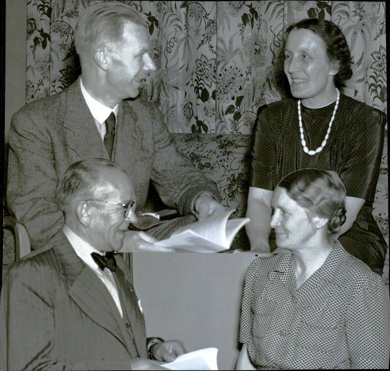 Folk school teacher Erik BjÃ¶rkman at the top of TV in concert with Lilly Long while folk teacher Birger Herrlander talks with Edit Moberg on the picture below - 30 June 1942 - Vintage Photograph