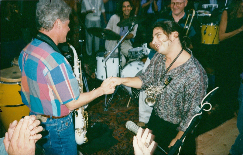 Bill Clinton playing the saxophone with the local band at the visit to Martha's Vineyard - Vintage Photograph