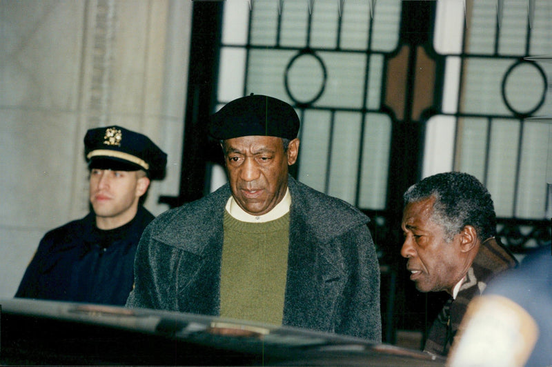 Bill Cosby and his wife Camille after they learned of his son's murder - Vintage Photograph