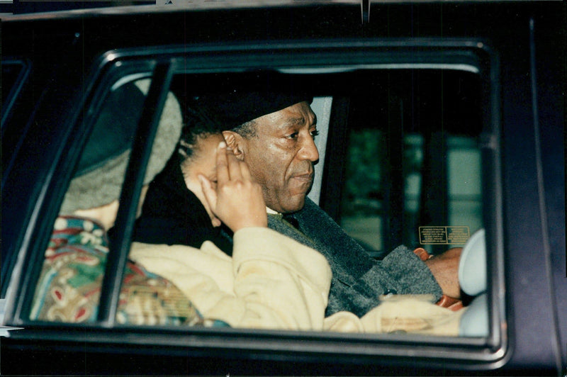 Bill Cosby and his wife Camille after they learned of his son's murder - Vintage Photograph