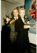 Phil Collins and Annie Lennox won both awards at &quot;The Brit Awards&quot;. - Vintage Photograph