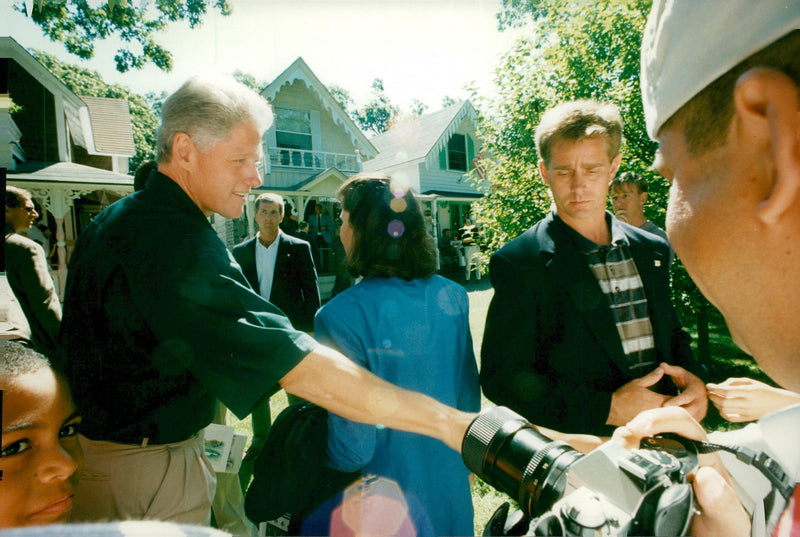 US President Bill Clinton greets the people during the visit to Martha&