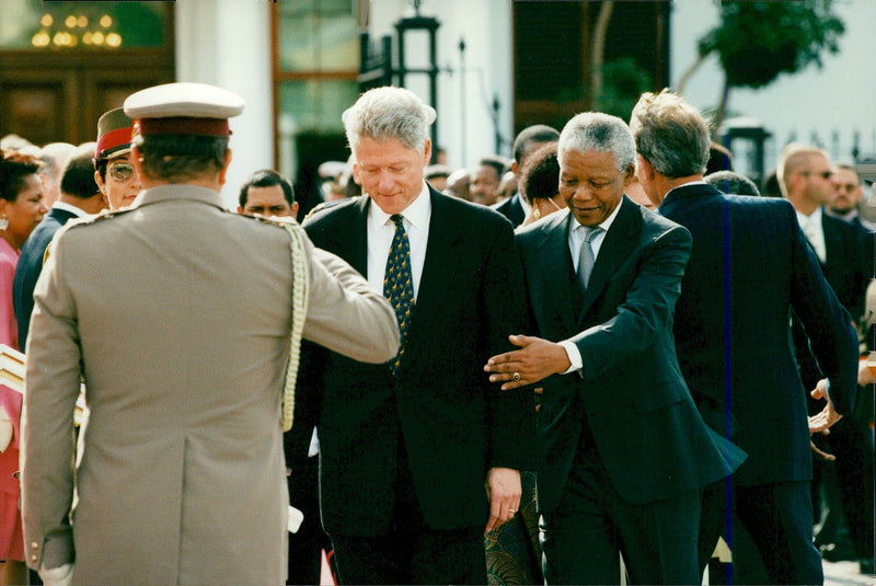 US President Bill Clinton along with South African President Nelson Mandela during the official reception on arrival at Cape Town - Vintage Photograph