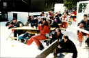 Dozens of photographers have gathered to photograph Princess Diana with the family during their skiing holiday in Lech am Arlberg - Vintage Photograph