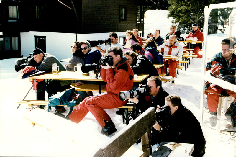 Dozens of photographers have gathered to photograph Princess Diana with the family during their skiing holiday in Lech am Arlberg - Vintage Photograph