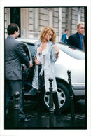 Pamela Anderson photographed during his visit to Paris. - Vintage Photograph