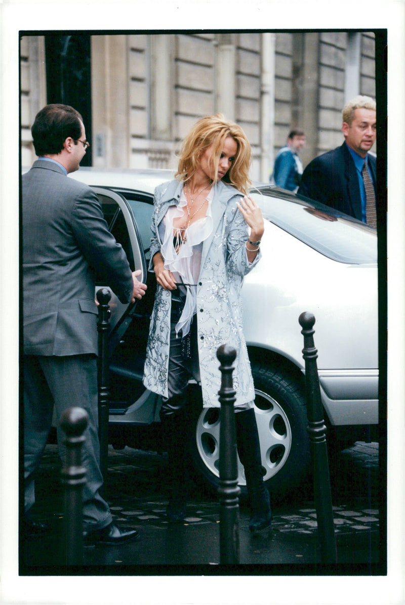 Pamela Anderson photographed during his visit to Paris. - Vintage Photograph