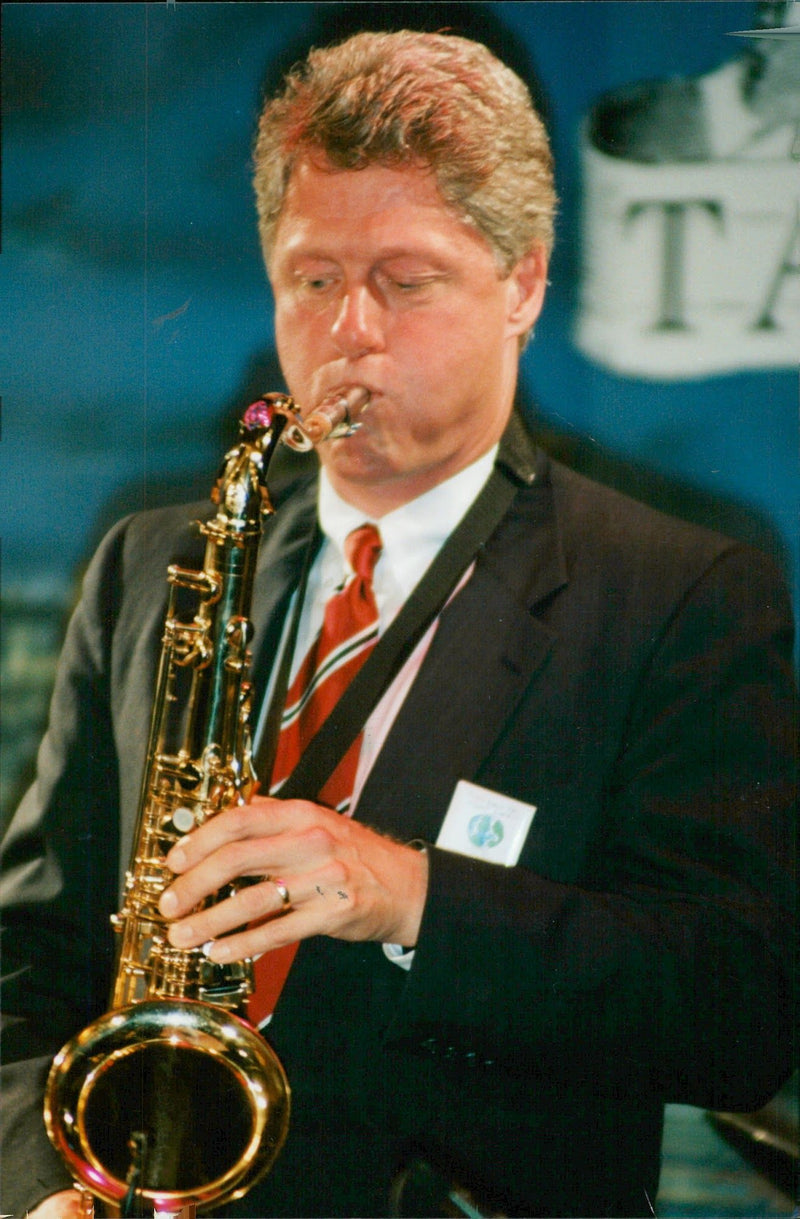 Bill Clinton plays the saxophone - Vintage Photograph