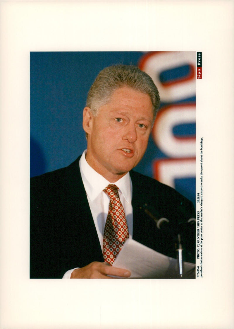 President Bill Clinton speaks at a press conference - Vintage Photograph