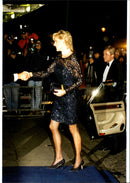 Princess Diana arrives at a charity event at the Royal Opera. - Vintage Photograph