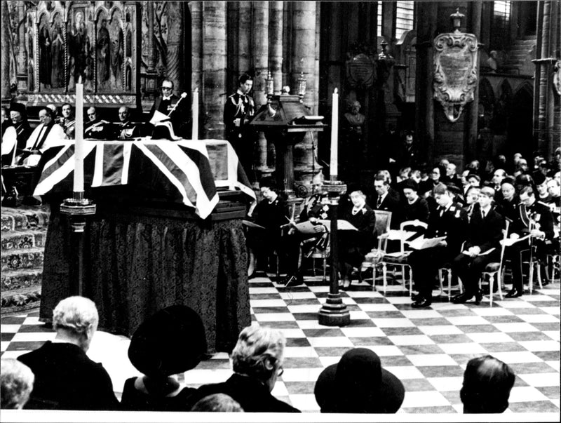 Prince Charles speaks at the Earl Mountbattens funeral in Westminster Abbey. Queen Elizabeth and Prince Philip is seen in the first row - Vintage Photograph