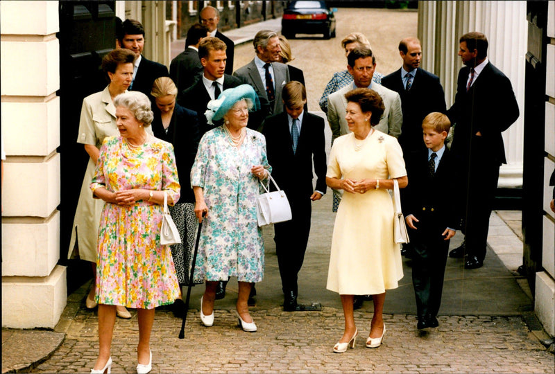 Queen Elizabeth II and Princess Margaret surrounding the Queen Mother for her birthday - Vintage Photograph