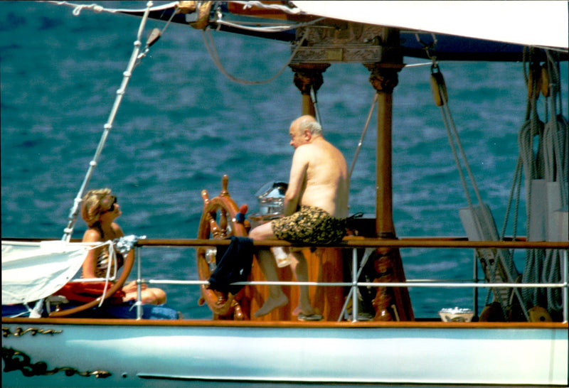 Princess Diana talks with Mohamed Al-Fayed on his yacht in Saint-Tropez - Vintage Photograph