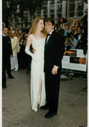 Nicole Kidman and Tom Cruise arrive at the premiere of "Far and Away". - Vintage Photograph