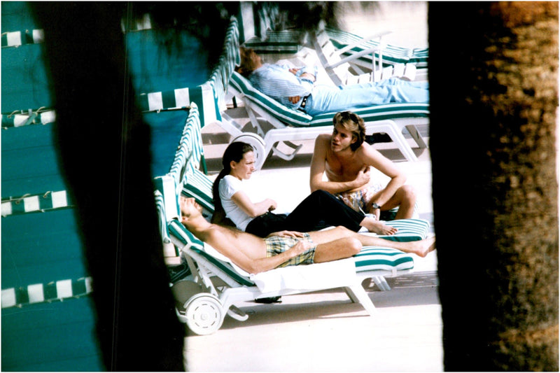 Emanuele Filiberto sunbathing on the beach with his fiancee Alejandra di Andia - Vintage Photograph