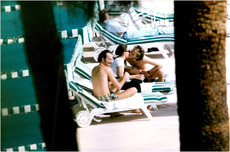 Emanuele Filiberto sunbathing on the beach with his fiancee Alejandra di Andia - Vintage Photograph