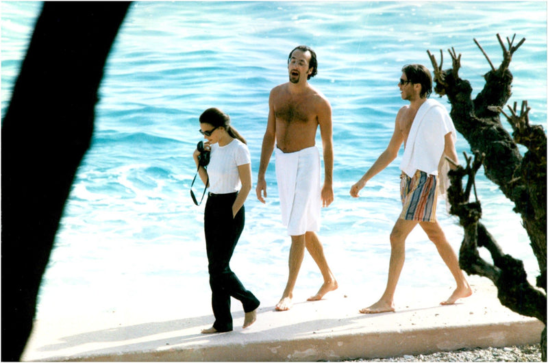 Emanuele Filiberto strolling on the beach with his fiancee Alejandra di Andia and a friend - Vintage Photograph