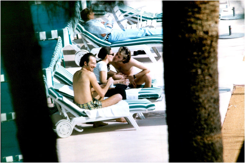 Emanuele Filiberto sunbathing on the beach with his fiancee Alejandra di Andia - Vintage Photograph