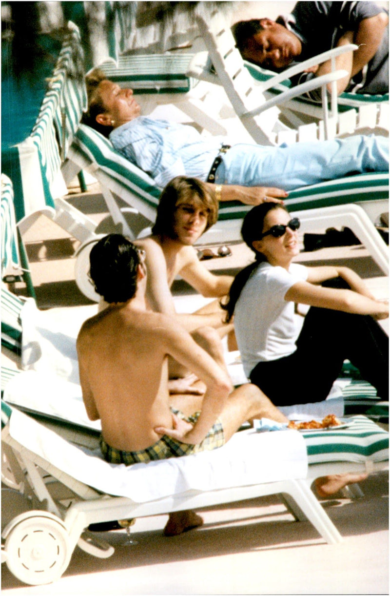 Emanuele Filiberto sunbathing on the beach with his fiancee Alejandra di Andia - Vintage Photograph