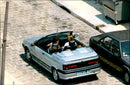Princess Caroline of Monaco in a-good time with its new Renault 19 convertible, along with their children. She got it by Renault during the Grand Prix de Monaco. - Vintage Photograph