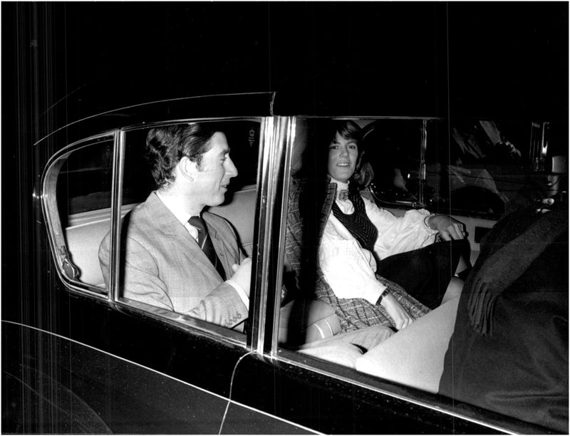 Prince Charles and Camilla Parker in the back seat of a car - Vintage Photograph