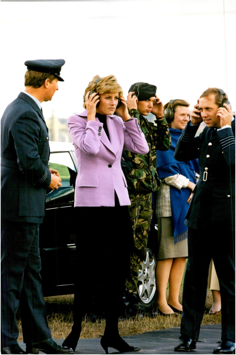 Princess Diana uses ear protection when flying a Harrier plane - Vintage Photograph