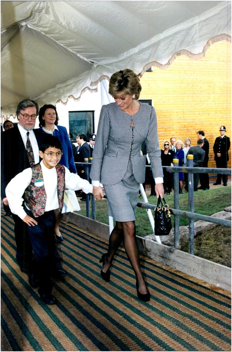 Princess Diana is shown around at the Institute of Conductive Education of 10-year-old Laurence Chambers - Vintage Photograph