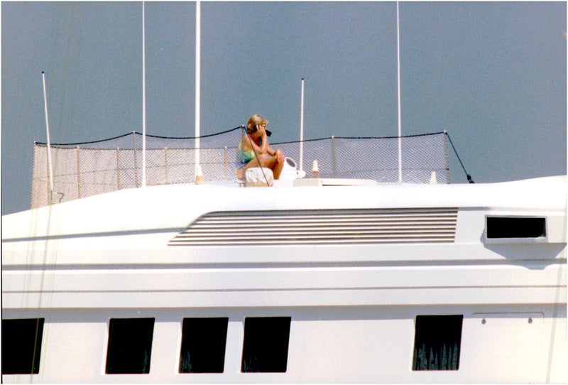 Princess Diana aboard a boat during her vacation at the French Riviera. - Vintage Photograph