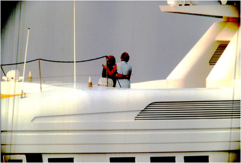 Princess Diana aboard a boat during her vacation together with Mohammed Al Fayed and his son Didi. - Vintage Photograph