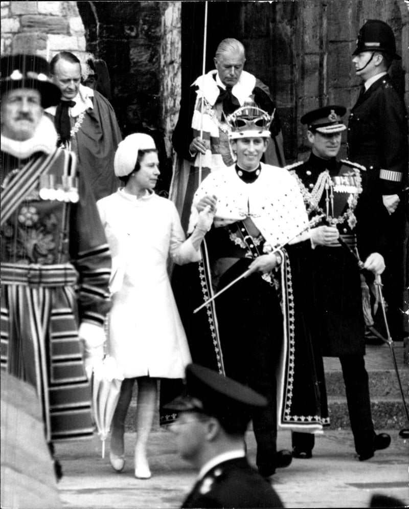 Prince Charles with his parents Queen Elizabeth II and Prince Philip after the coronation ceremony is completed - Vintage Photograph