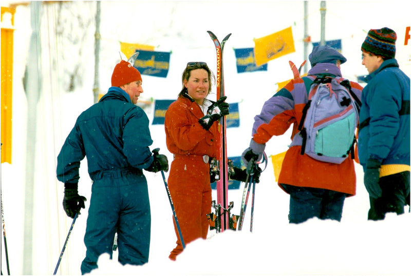 Prince Charles on a skiing holiday together with a whole lot of ladies. - Vintage Photograph