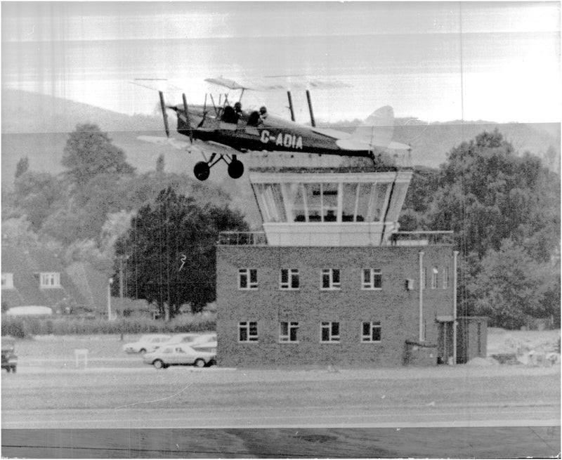 Prince Charles on his way up in the air in a Tiger Moth from the pre-war period, at RAF Benson. - Vintage Photograph