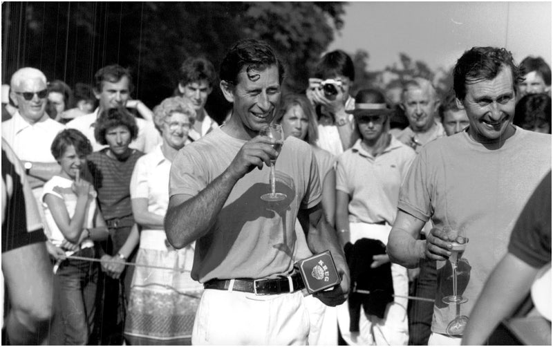 Prince Charles bowls of champagne after the polo match - Vintage Photograph