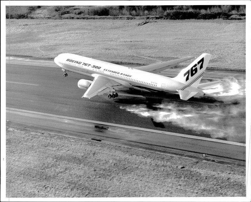 The Boeing 767-300 with 261 seats and route width of over 9000 kilometers, lightens on its maiden flight. - Vintage Photograph