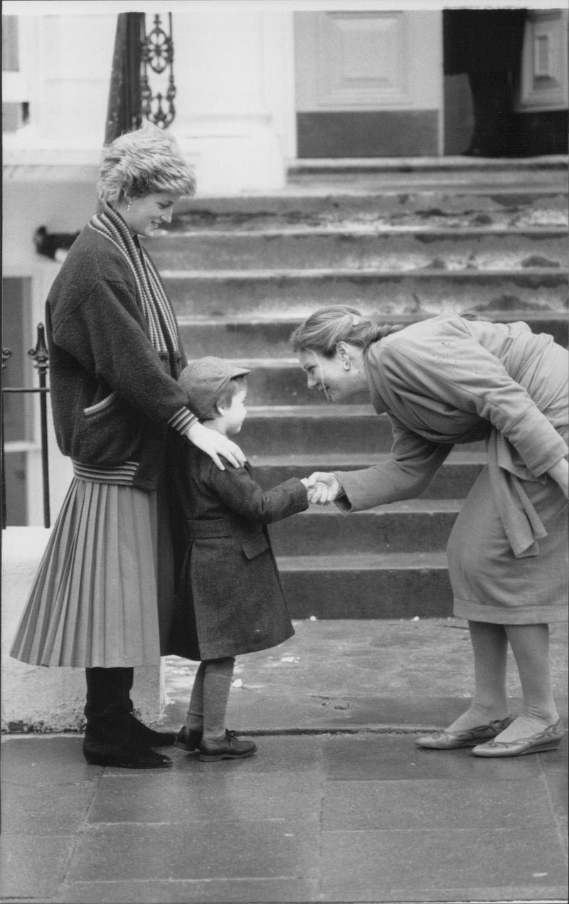 Prince Harry's first day at school. Here he greets the new president. Princess Diana is watching. - Vintage Photograph