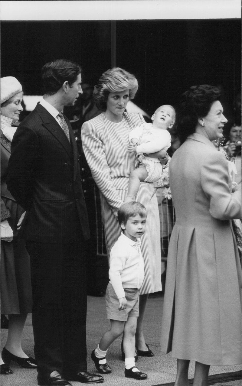 The English King Family on Cruise. Prince Charles and Princess Diana with the Prince William and Harry. - Vintage Photograph