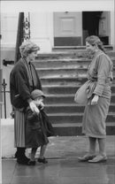 Princess Diana and Prince William outside the prince's school. - Vintage Photograph
