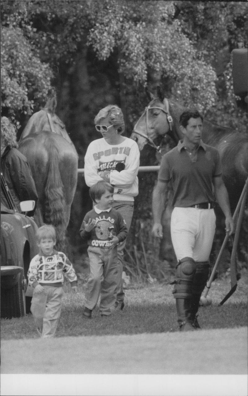 Princess Diana, Prince Harry, Prince William and Prince Charles in conjunction with a polomatch on Smith's Lawn. - Vintage Photograph