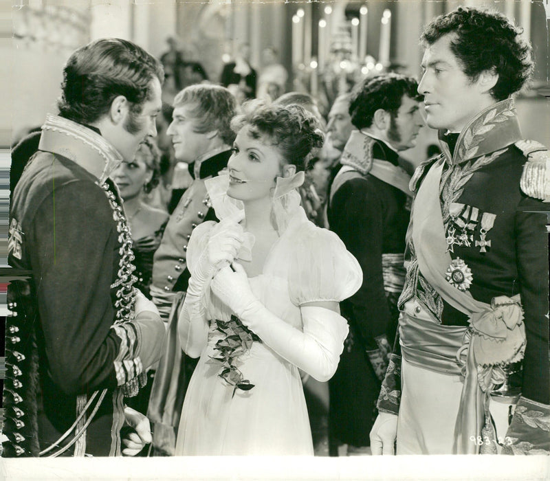 Greta Garbo along with Alan Marshal and George Houston in the movie "Marie Walewska" - 9 February 1938 - Vintage Photograph