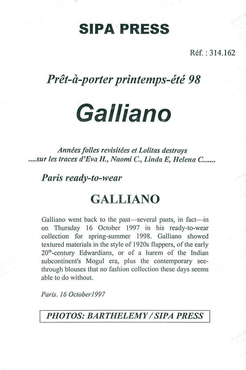 John Galliano with the model Naomi Campbell on his side during his spring summer fashion show - Vintage Photograph