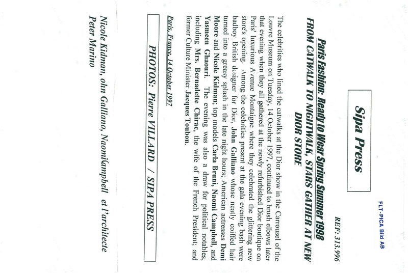 John Galliano surrounded by models at the Paris Fashion Week - Vintage Photograph