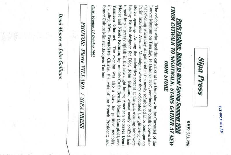 John Galliano surrounded by models at the Paris Fashion Week - Vintage Photograph