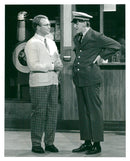 Per Fritzell and Anders Eriksson in a scene from the father's musical "Stinsen brinner". - Vintage Photograph
