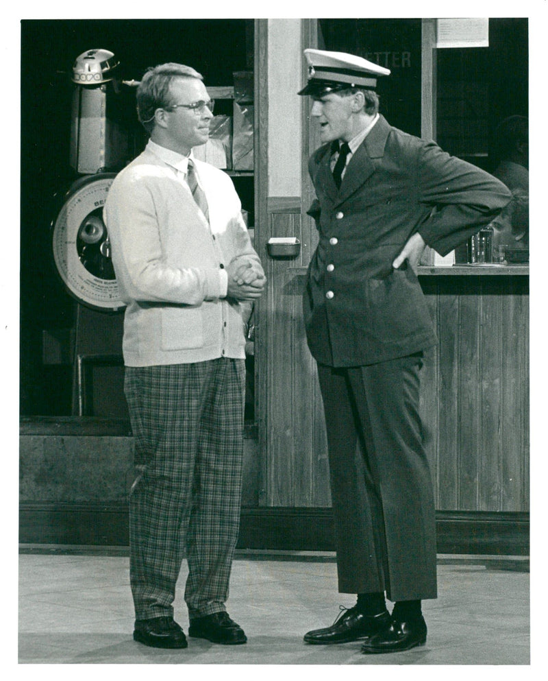 Per Fritzell and Anders Eriksson in a scene from the father's musical "Stinsen brinner". - Vintage Photograph