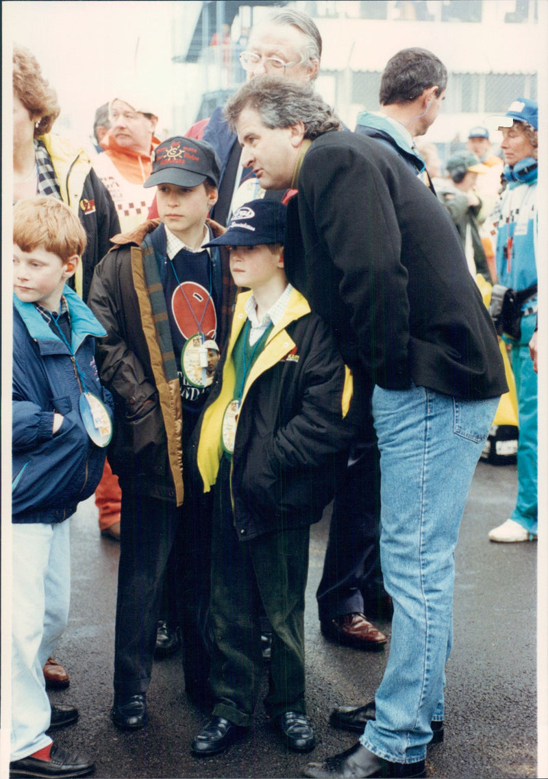 Prince William and Harry have a day out with their mother Diana at the European Grand Prix in Donington Park. - Vintage Photograph