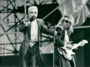 Concert image of Dave Stewart and Annie Lennox from the gig at Stockholm Stadium. - Vintage Photograph