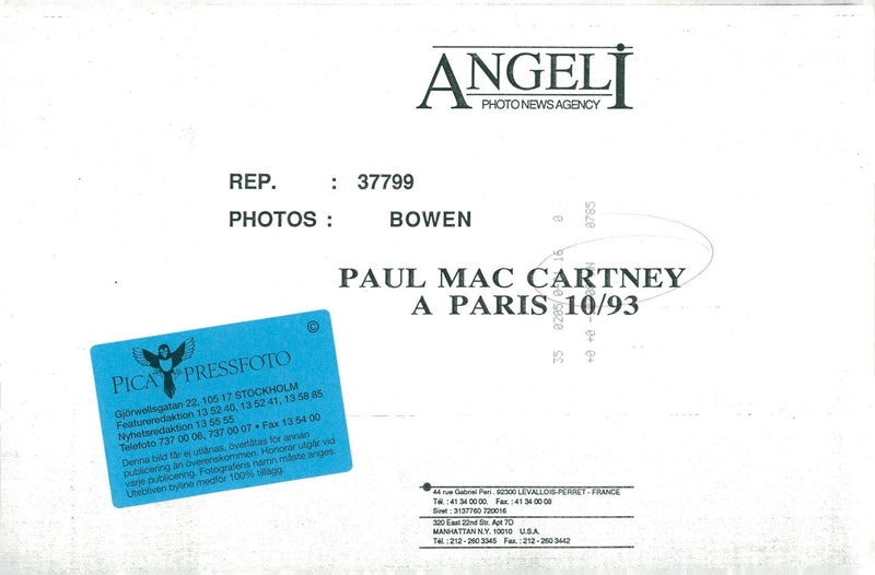 Paul McCartney tries to avoid the crowd - Vintage Photograph