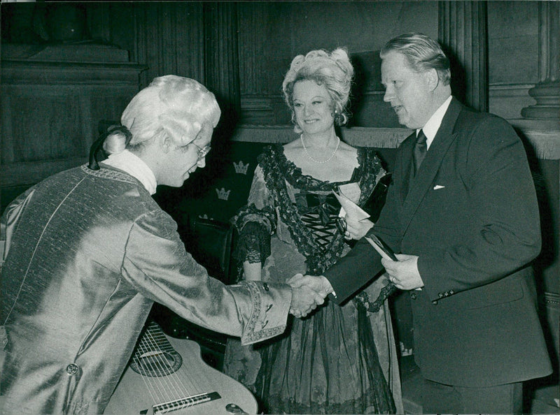 Guitarist GÃ¶ran SÃ¶llscher, chief singer Barbro Ericson and poet Bo Setterlind at King Gustaf V's jubilee fund's 50th anniversary - Vintage Photograph